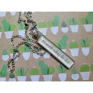 Worth Rolling the Dice necklace made with Husband Material book pages